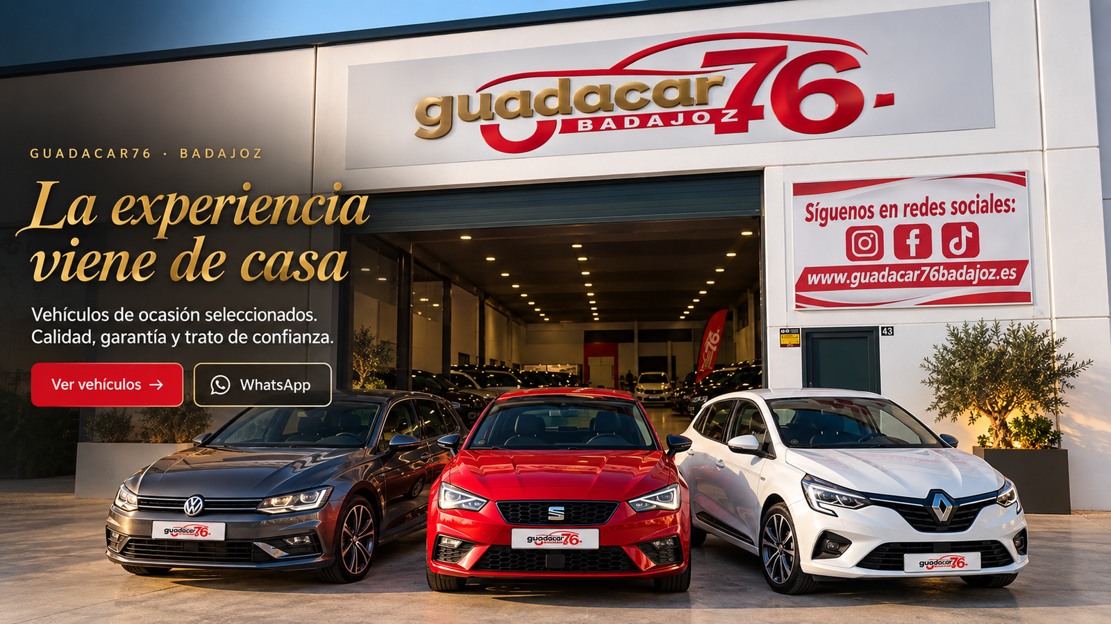 Fachada de GUADACAR76 en Badajoz con tres vehículos gris, rojo y blanco.